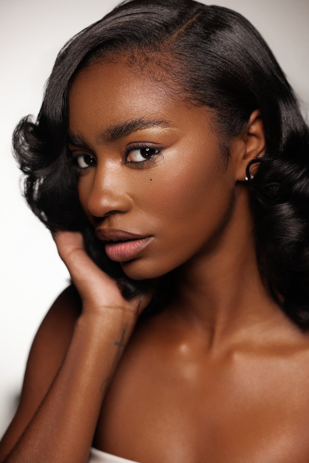 Editorial beauty portrait with a soft nude lip